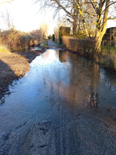 The photo for Standing puddle / ice on Crab & Winkle Way in winter.
